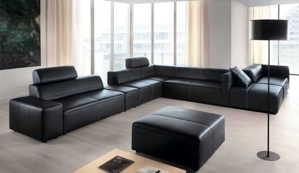 Canapele moderne din stofa sau piele