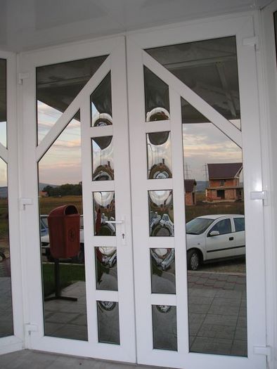 Tamplarie PVC ( termopane si usi de garaj )