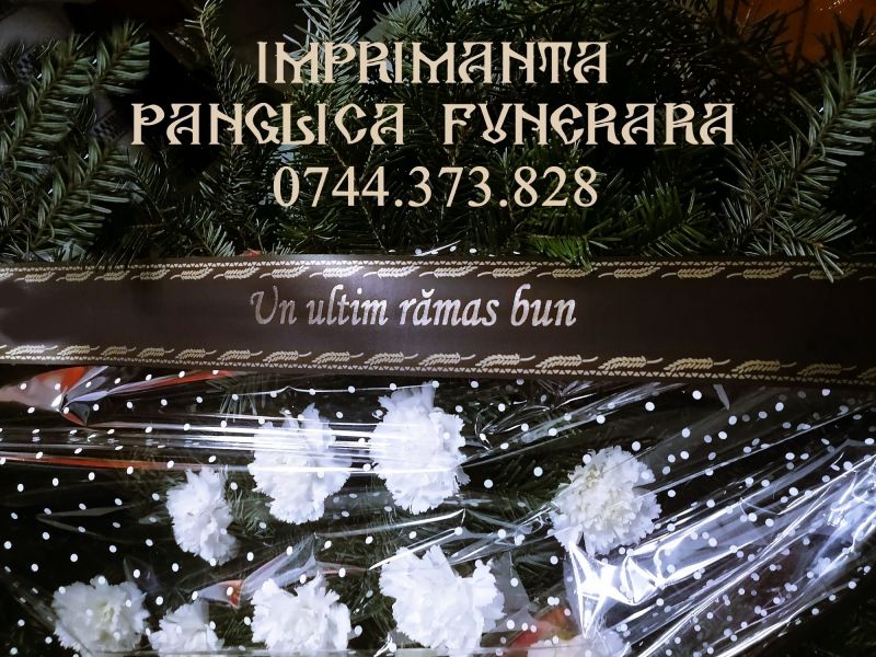 Masina de scris panglica funerara.      